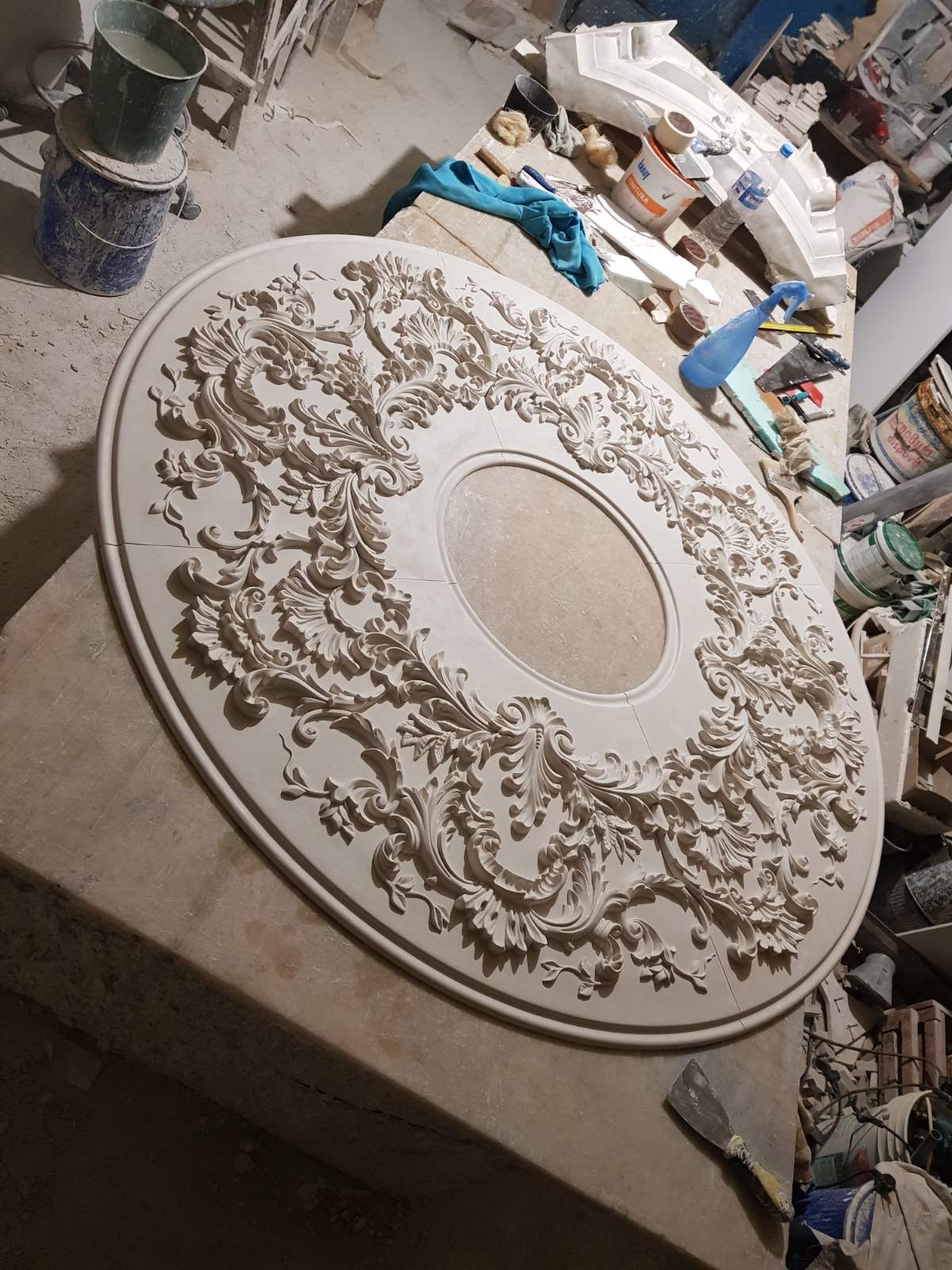 The ornamental ceiling rose taking shape in the workshop