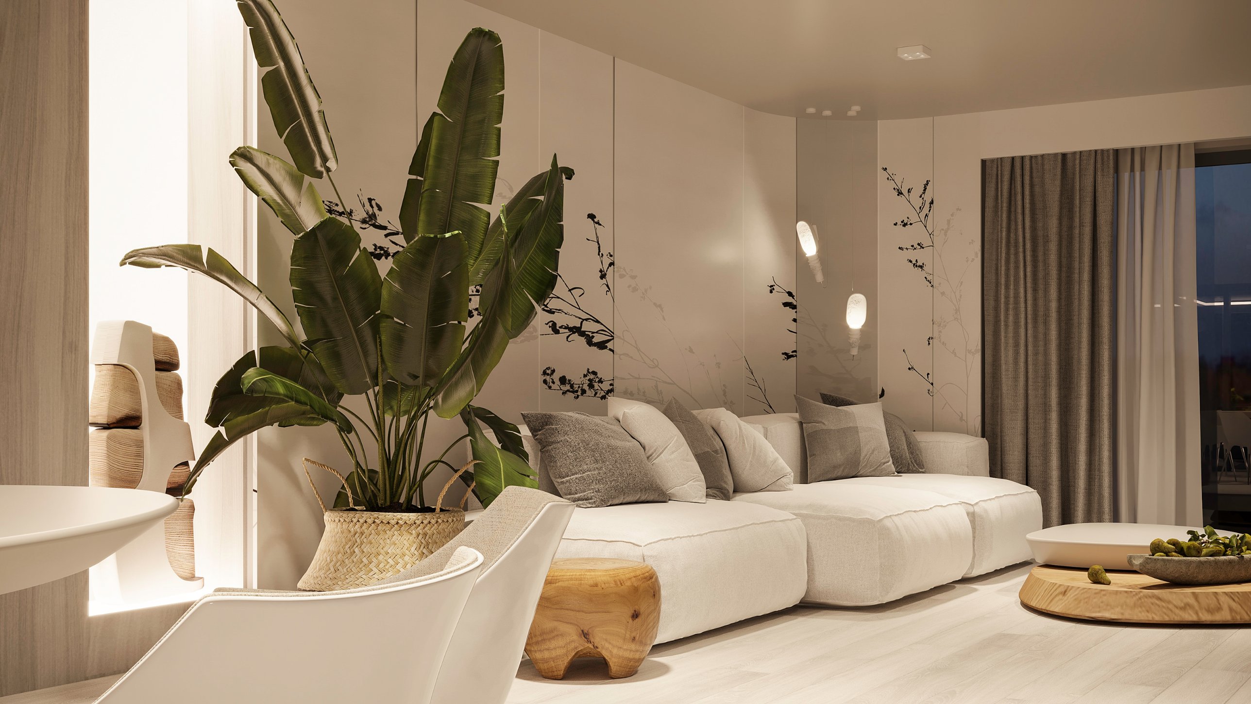 Living room with a long white sofa before panels painted with dark botanical silhouettes, beside a tall banana plant