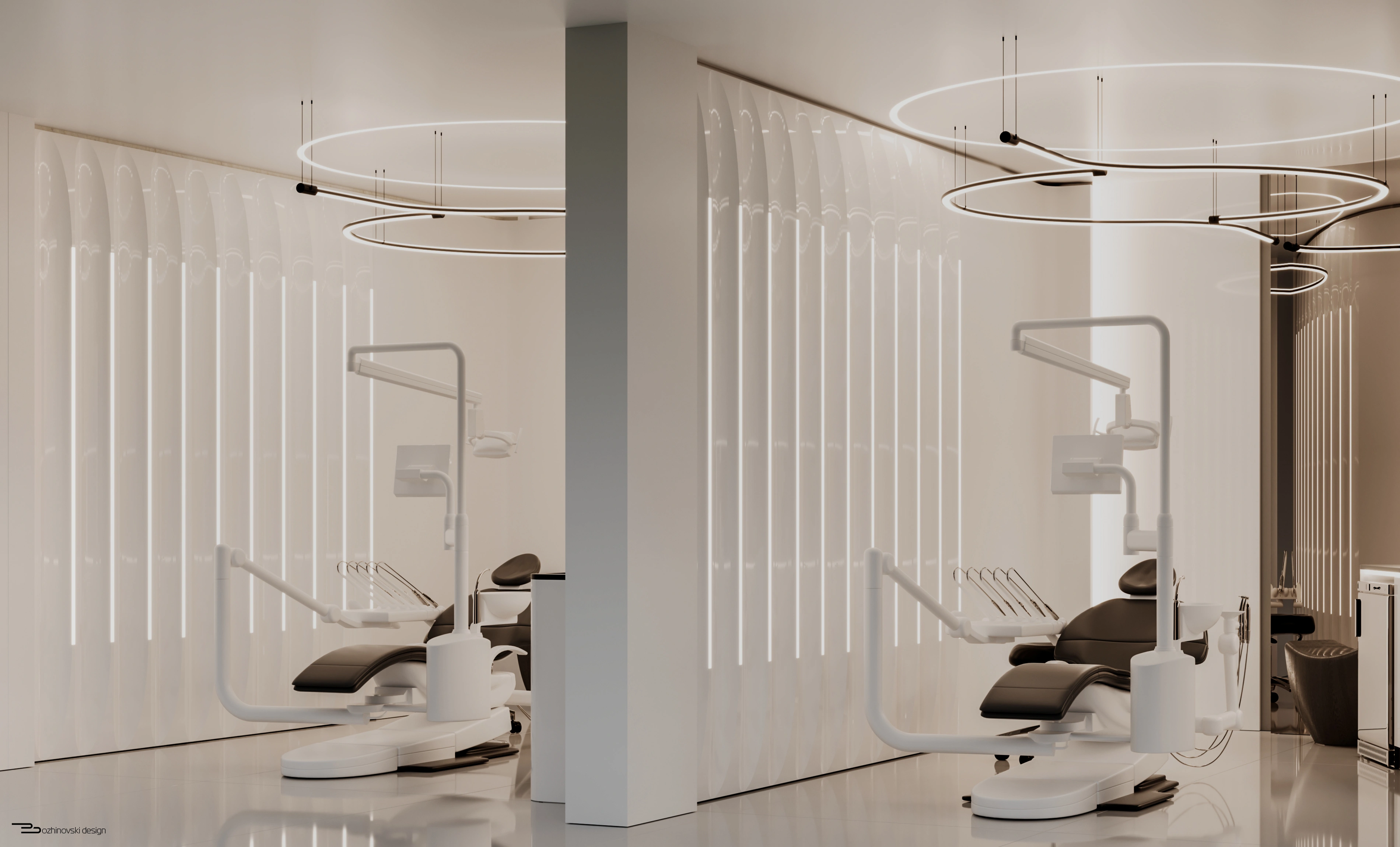 Two treatment bays beneath suspended circular lights