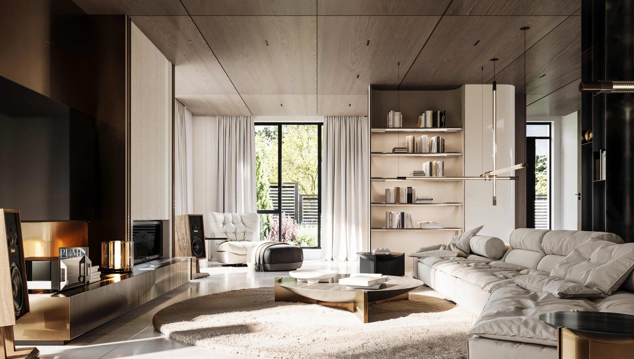 Living room with a deep cream sectional, a round bronze table and a curved bookcase before tall curtained windows