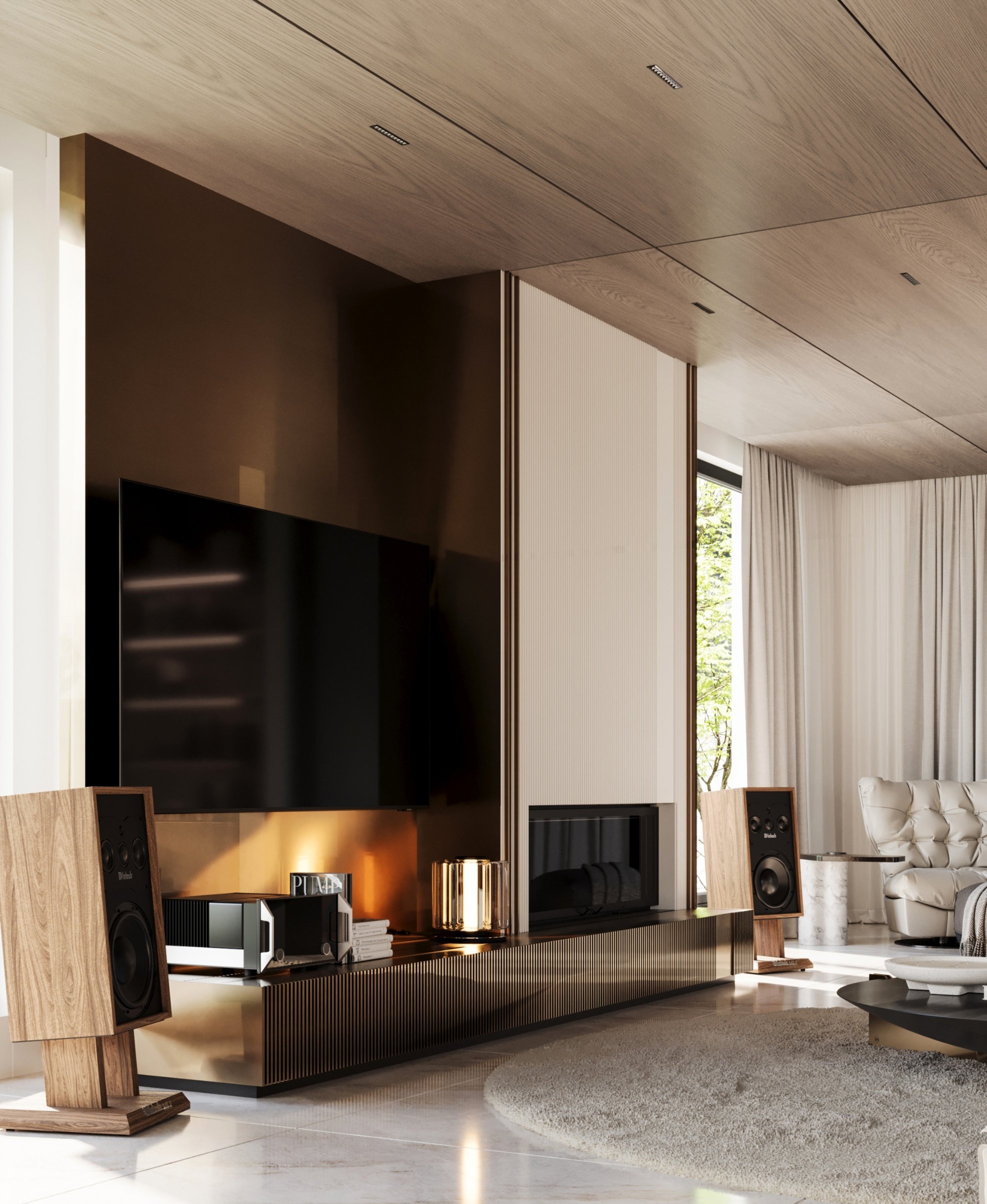 The bronze media wall with a fire beneath the screen, walnut speakers and a fluted white panel