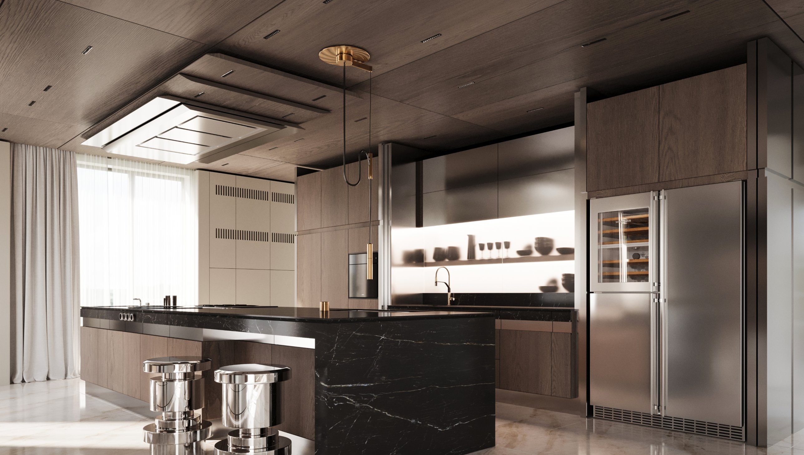The kitchen with a black stone island, polished metal stools, a lit recess and a brass pendant beneath the timber ceiling