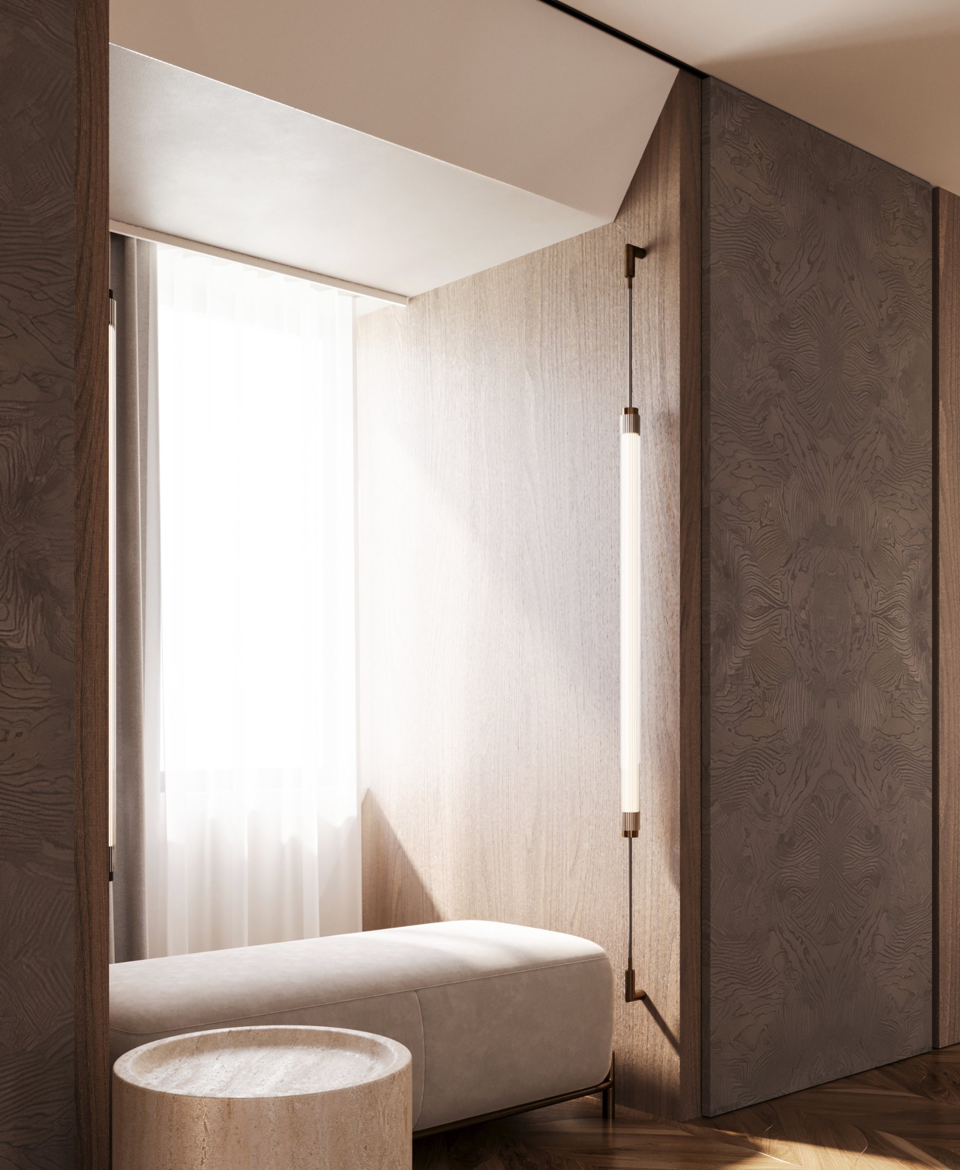 A window seat between figured timber panels, lit by a slender wall light