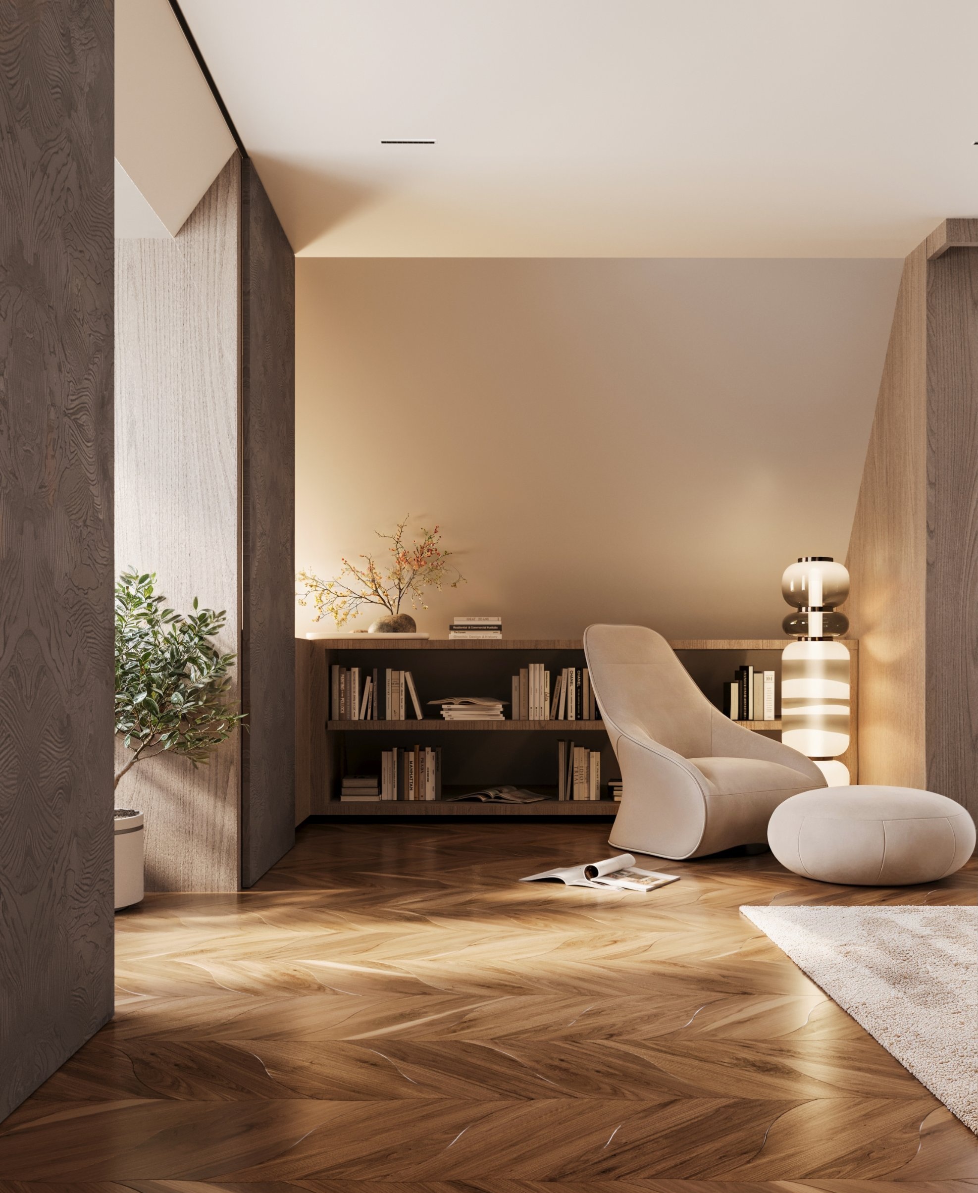 A reading corner with a soft lounge chair, pouf and stacked glass lamp