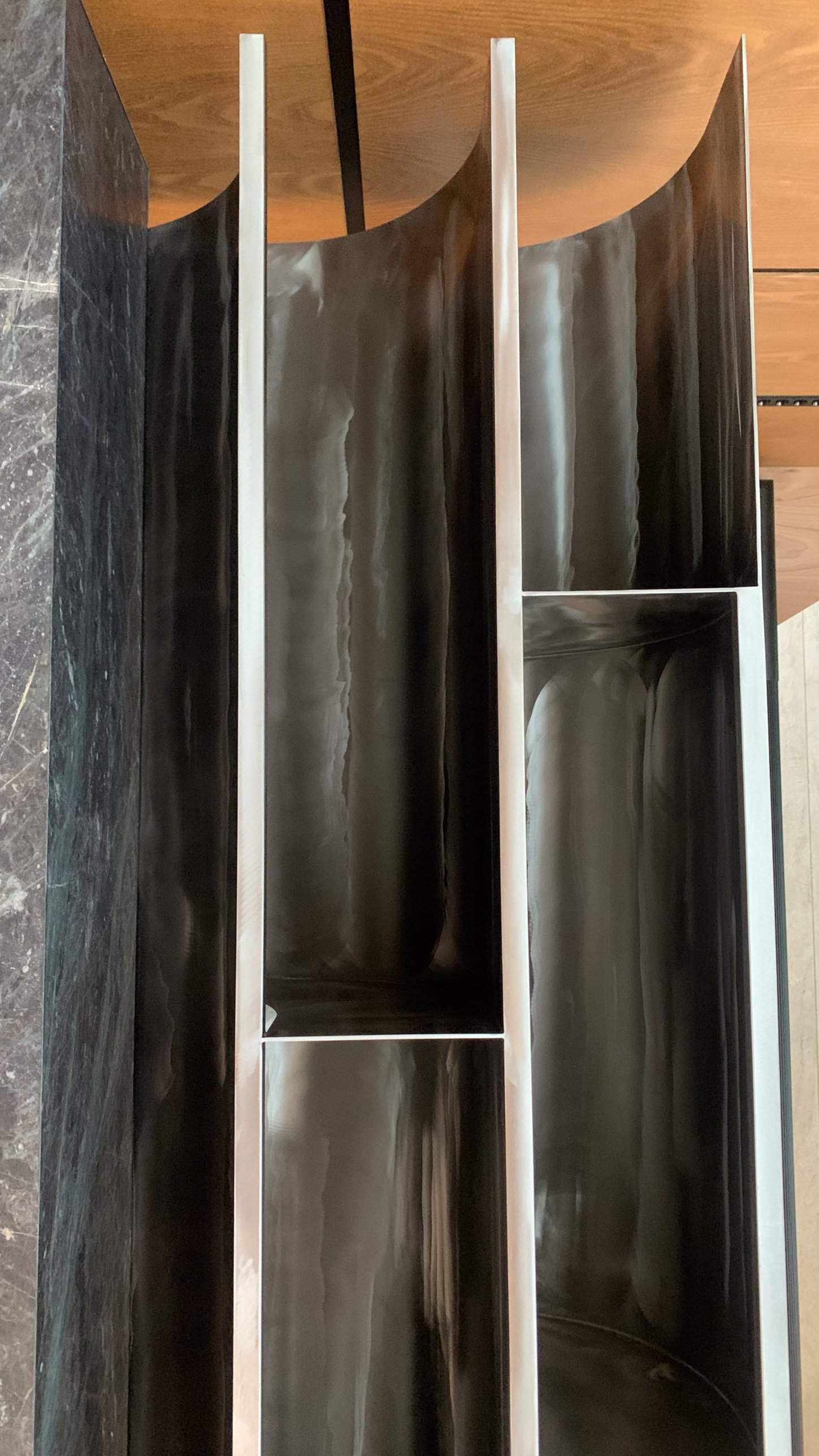 Inside the curved metal shelving