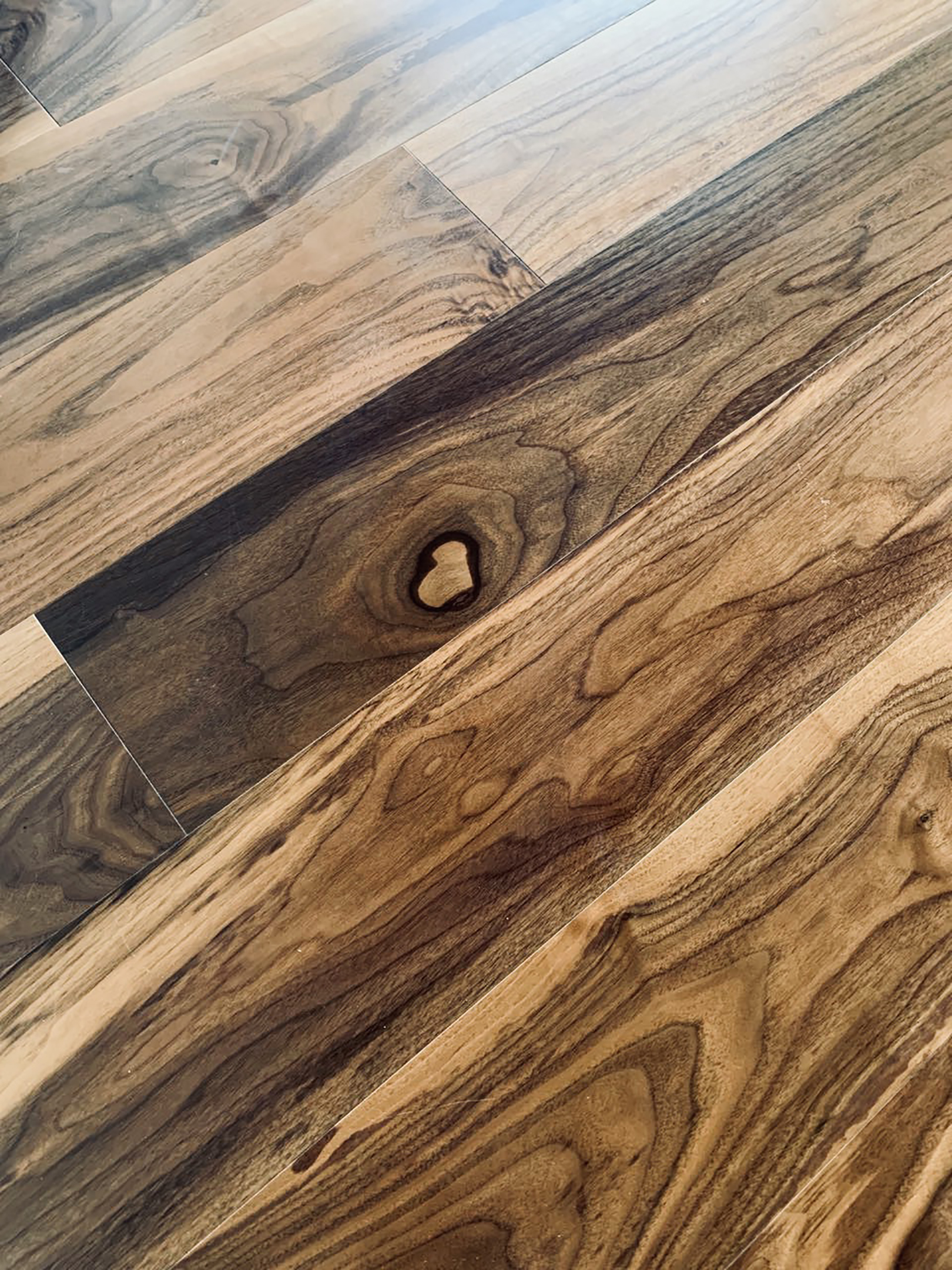 Close view of the richly figured walnut floor