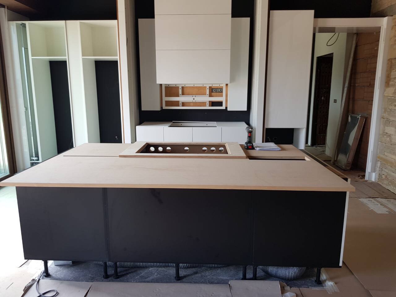 The kitchen island during assembly