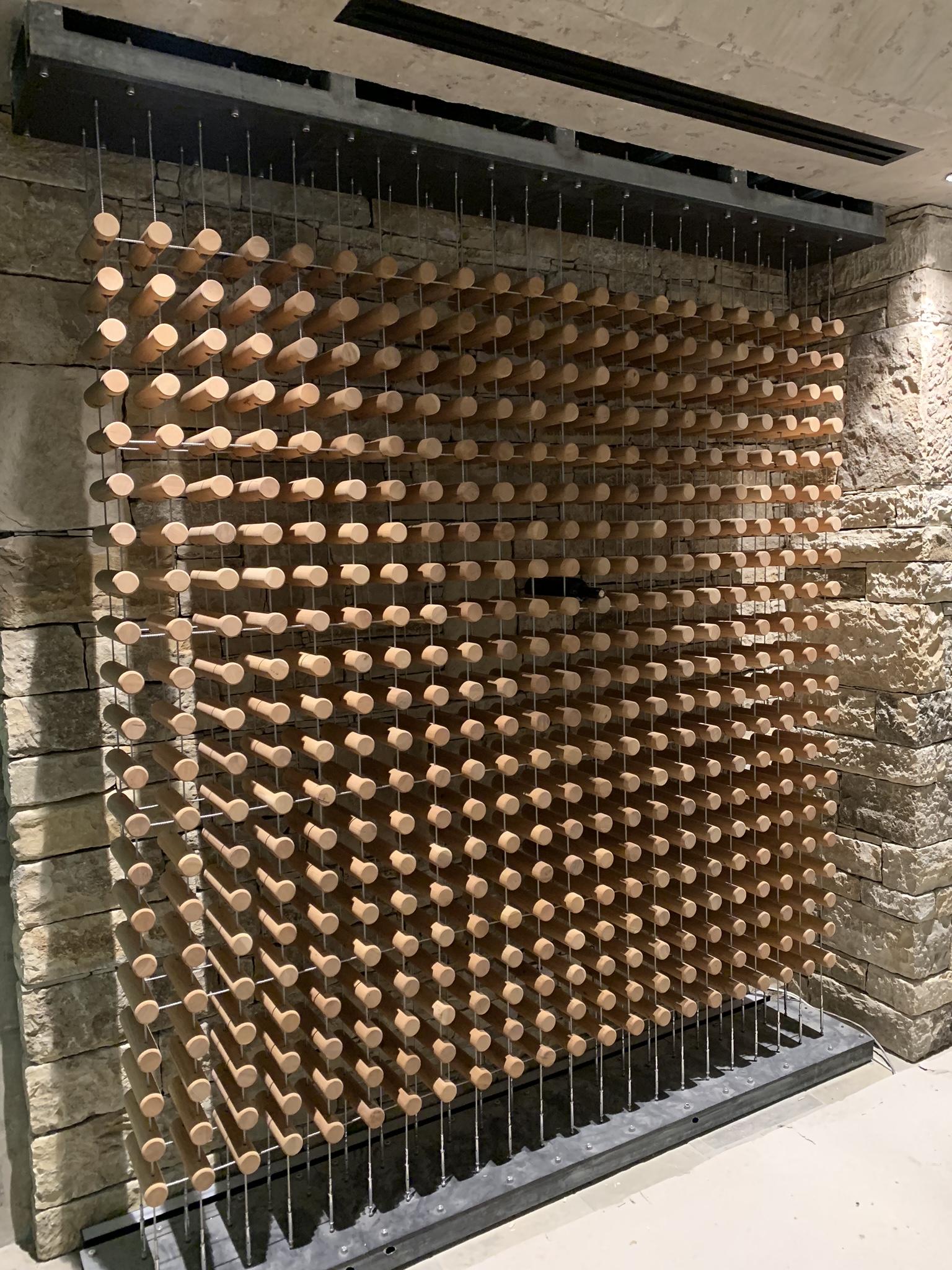 The suspended timber wine wall