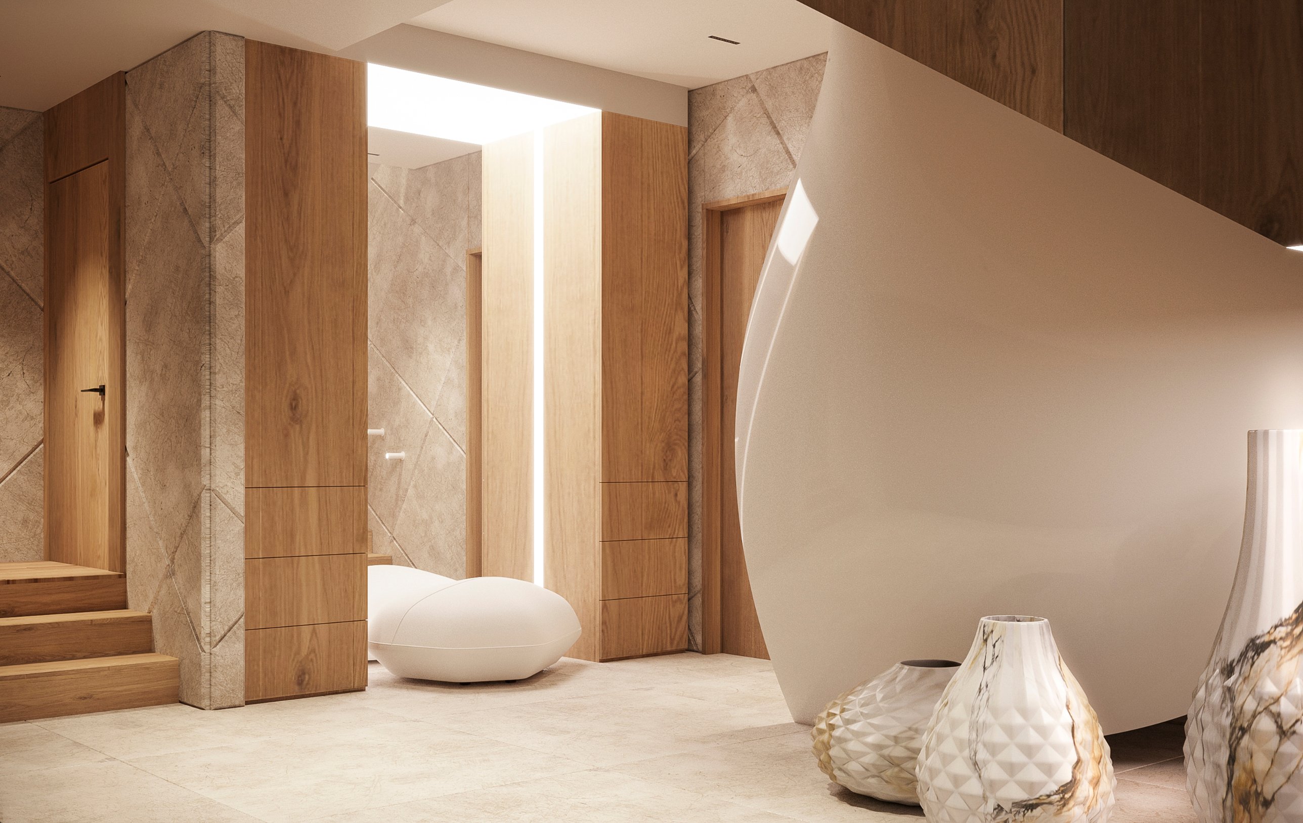 The hall with the wave staircase and a white pebble pouf