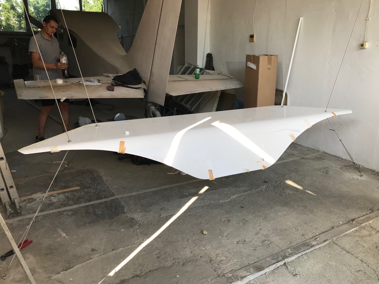 The white reception desk suspended for finishing