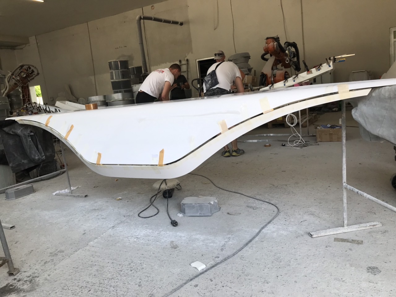 Craftsmen working on the reception desk surface